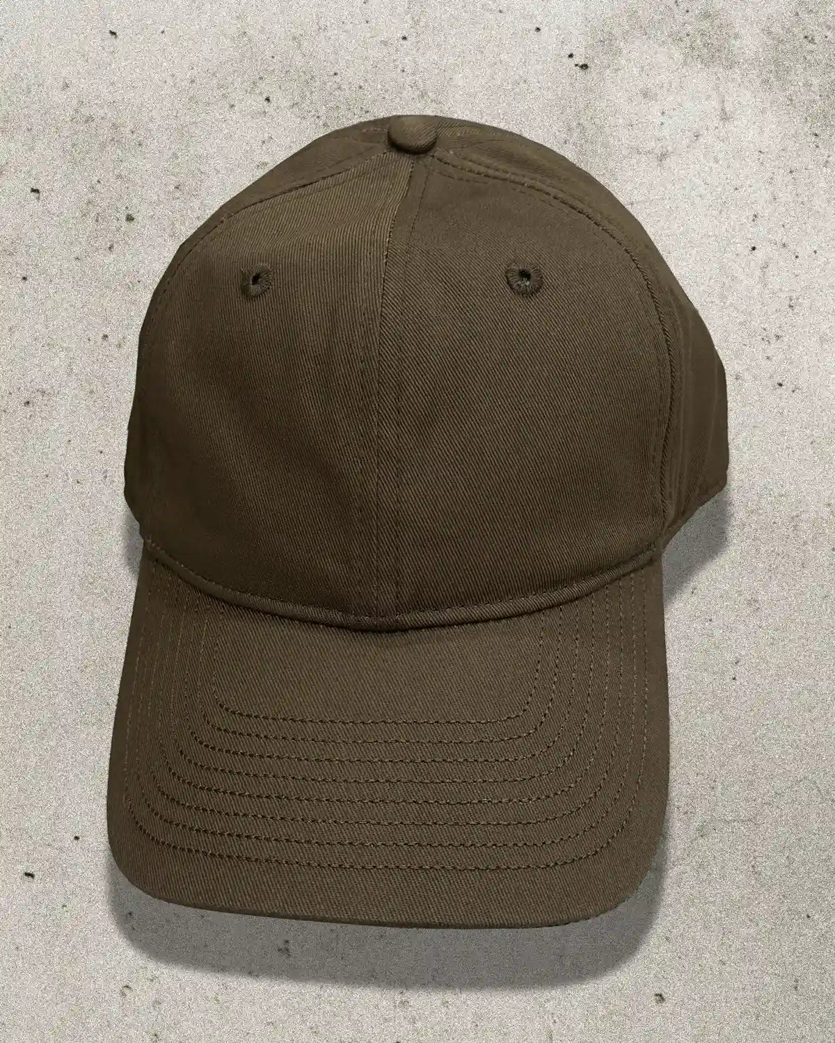Front-facing view of Bullyboy Blank Cap in brown with unbranded crown and soft structure