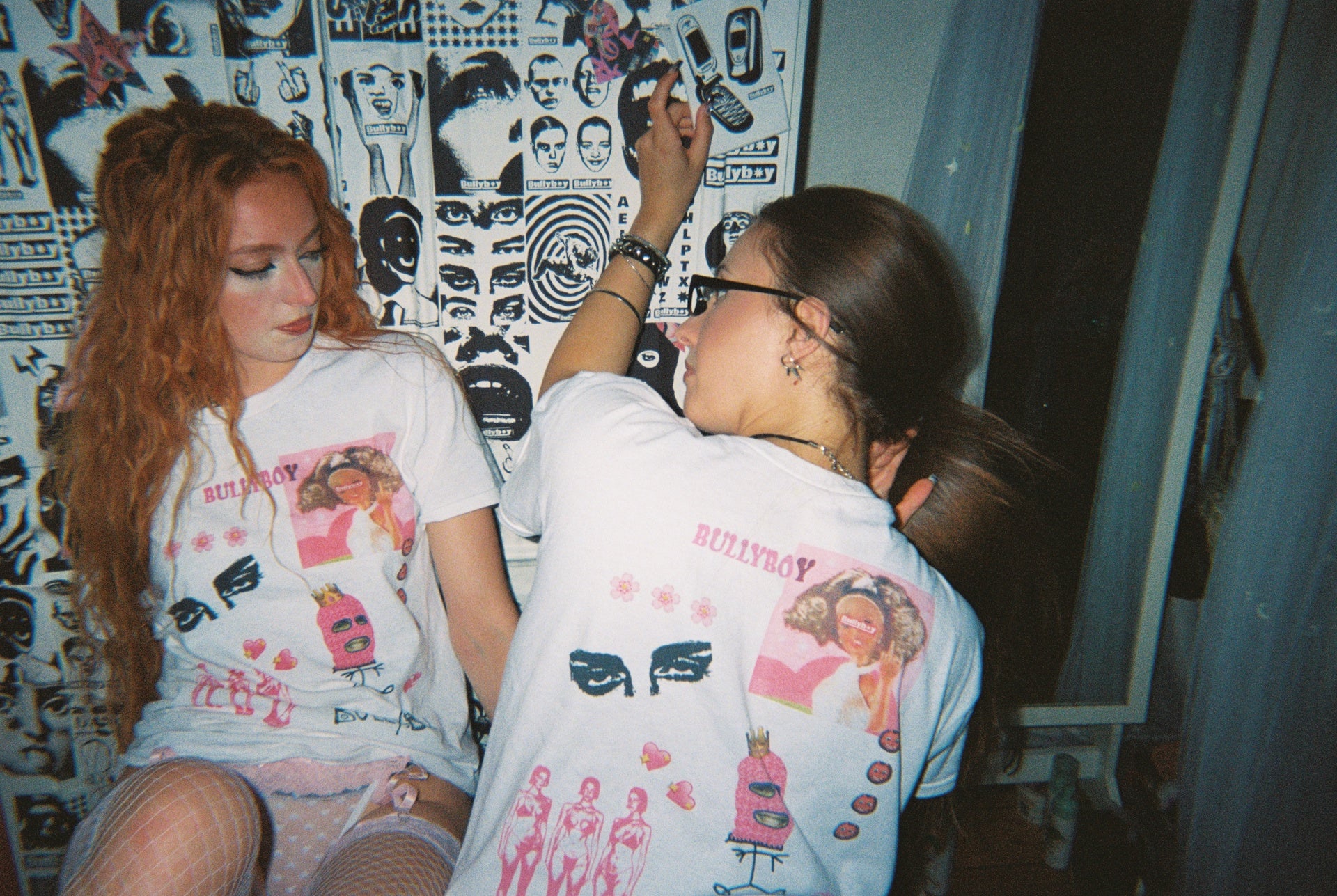 Two Bullyboy models wearing the Bullyboy CNTY t-shirt with the Bullyboy stickers featured in the background