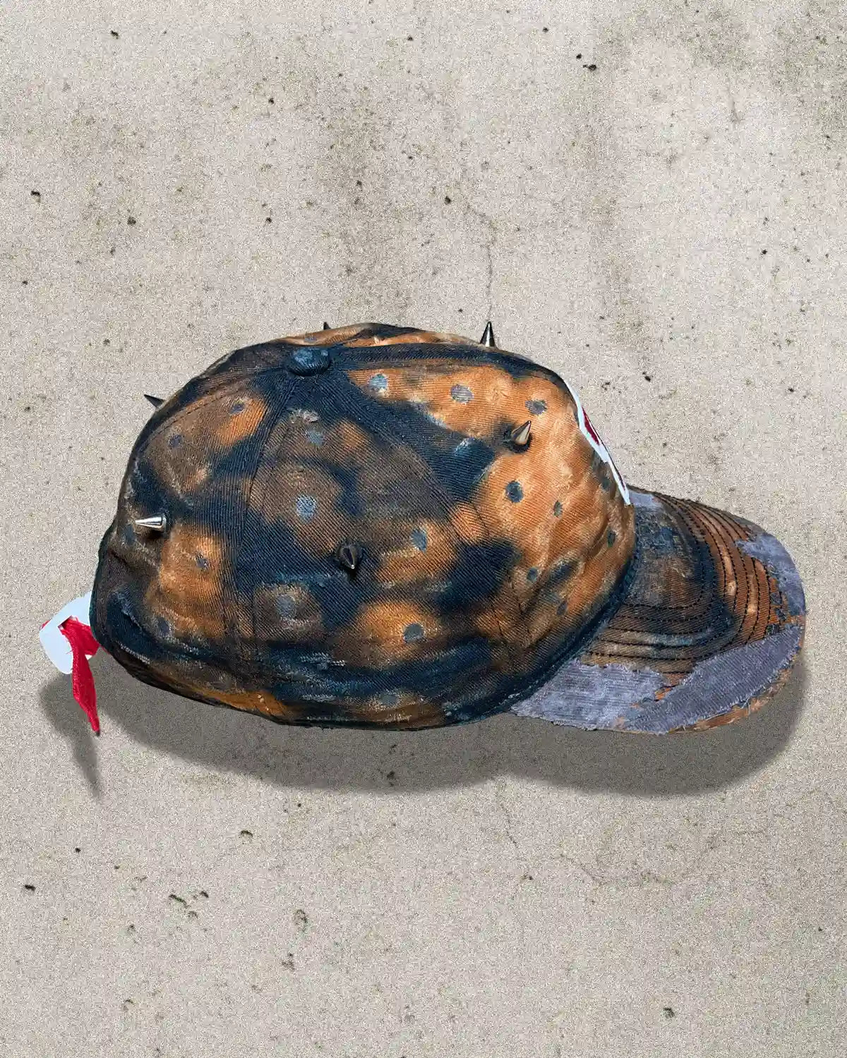 Rust Bucket streetwear cap side angle showing silver spikes and distressed details – Bullyboy headwear