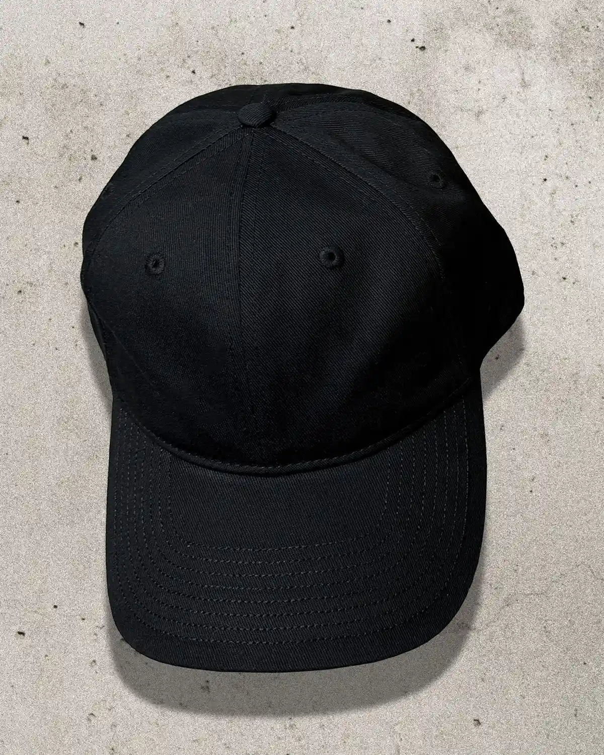 Front view of Bullyboy Blank Cap in black with minimal design and curved brim
