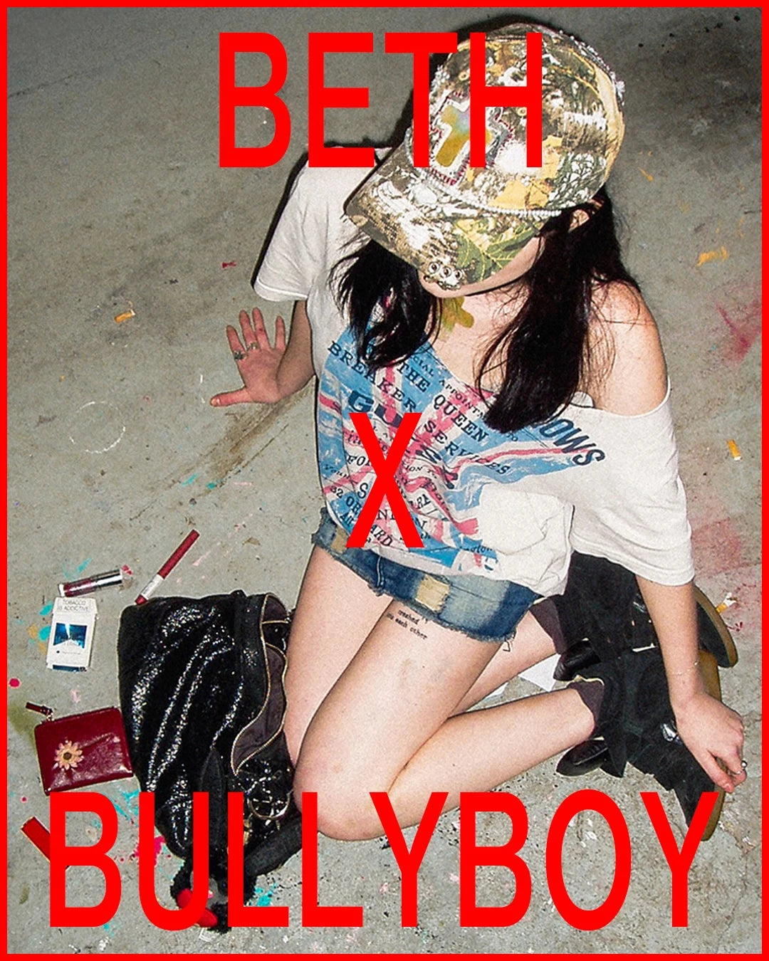 Person sitting on the ground with text overlay 'BETH' and 'BULLYBOY' on a red border.