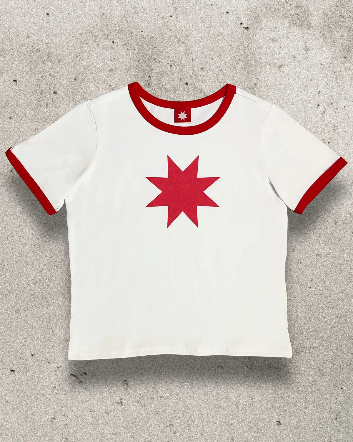 White 100% lightweight cotton fitted top with the Bullyboy star logo on the front.