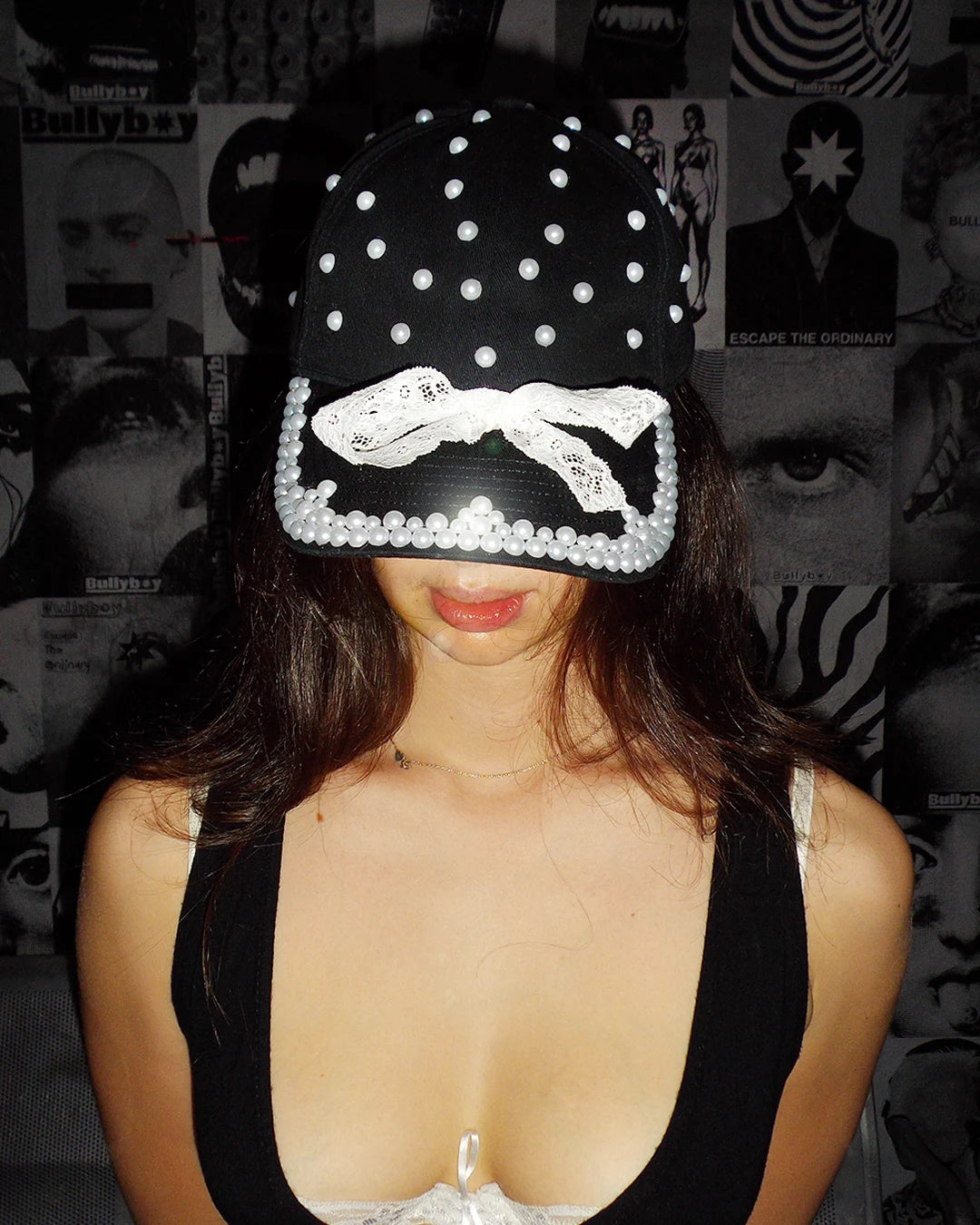 Black baseball cap with pearls stuck onto the one of one cap 