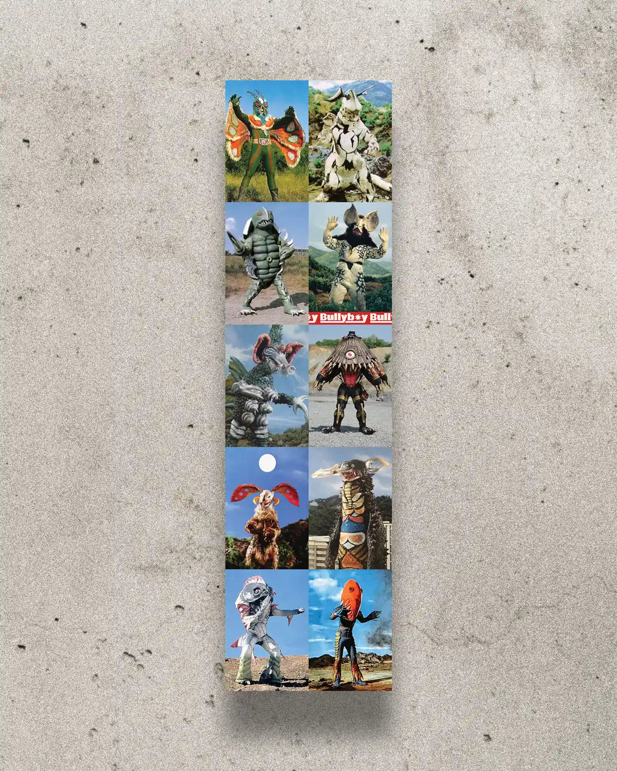 Kaiju-inspired skateboard grip tape with old-school Japanese monster illustrations.
