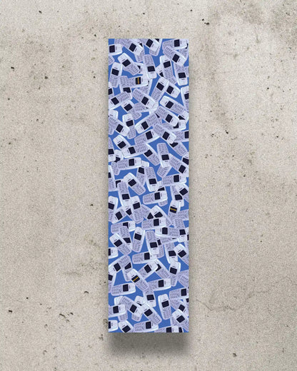 Nostalgic skateboard grip tape with a design featuring Nokia 3310 phones.
