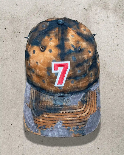 One of one distressed dad cap in rusty orange with metal spikes – front view of Bullyboy Rust Bucket cap